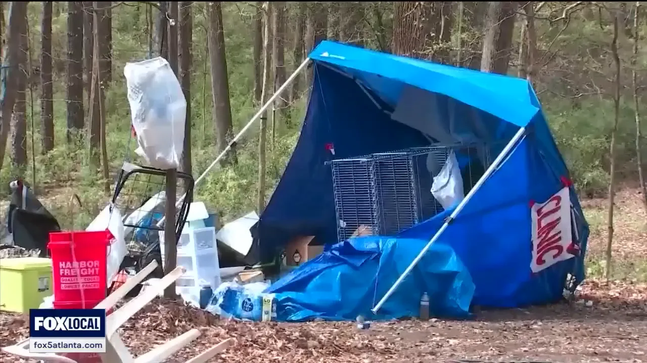 Police removing campers from the property